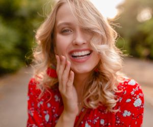 marymandarinka/ attractive stylish blond smiling woman in straw red blouse summer fashion/ envato