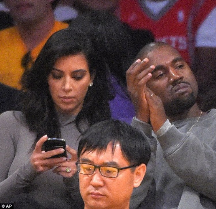 1414580871178_Image_galleryImage_Kim_Kardashian_left_and_s.JPG