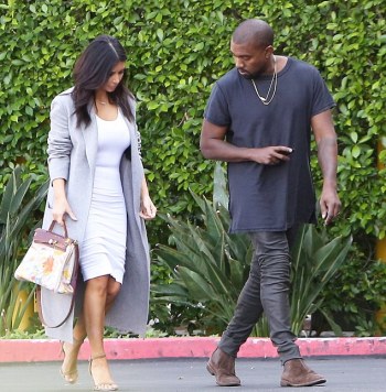 1415654687654_Image_galleryImage_Kim_Kardashian_and_Kanye_.JPG